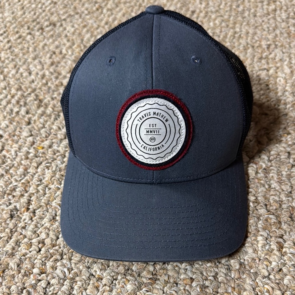 Travis Mathew Blue and Black Hat with Spiral Emblem